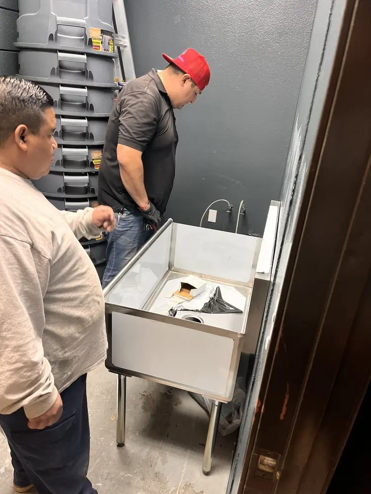 Commercial plumbing and sink installation in Grant